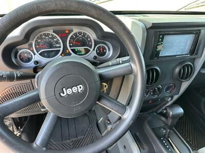 2010 Jeep Wrangler Unlimited Sport   - Photo 12 - Jacksonville, FL 32211