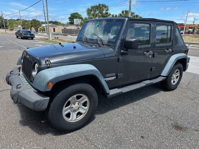2010 Jeep Wrangler Unlimited Sport   - Photo 1 - Jacksonville, FL 32211