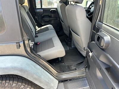 2010 Jeep Wrangler Unlimited Sport   - Photo 15 - Jacksonville, FL 32211