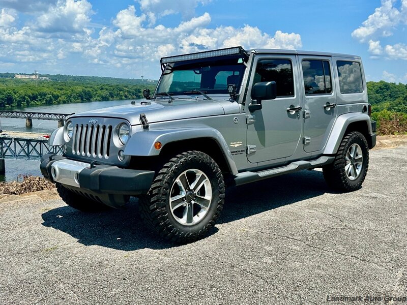 2015 Jeep Wrangler Unlimited Sahara - Photo 1 - Muscle Shoals, AL 35661