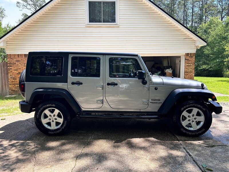 2015 Jeep Wrangler Unlimited Sport S - Photo 1 - Shreveport, LA 71101