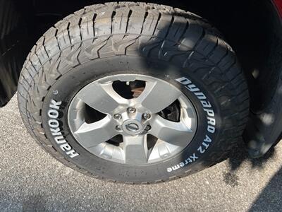 2012 Nissan Xterra X 4WD ONE OWNER NEW TOYOTA TRADE  NEW TIRES AND BRAKES ALL ORIGINAL  L PAINT LIKE NEW - Photo 32 - Brooklyn, NY 11218