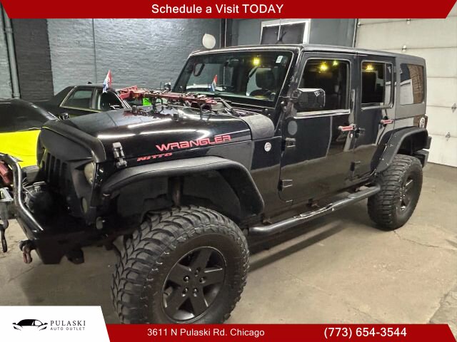 2013 Jeep Wrangler Unlimited Sport SUV 4D - Photo 1 - Chicago, IL 60641