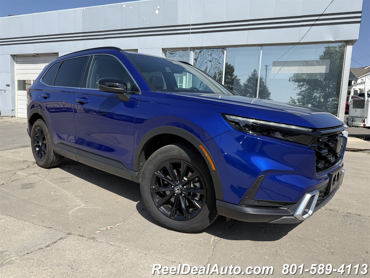 2023 Honda CR-V Hybrid Sport Touring - Photo 1 - North Salt Lake, UT 84010