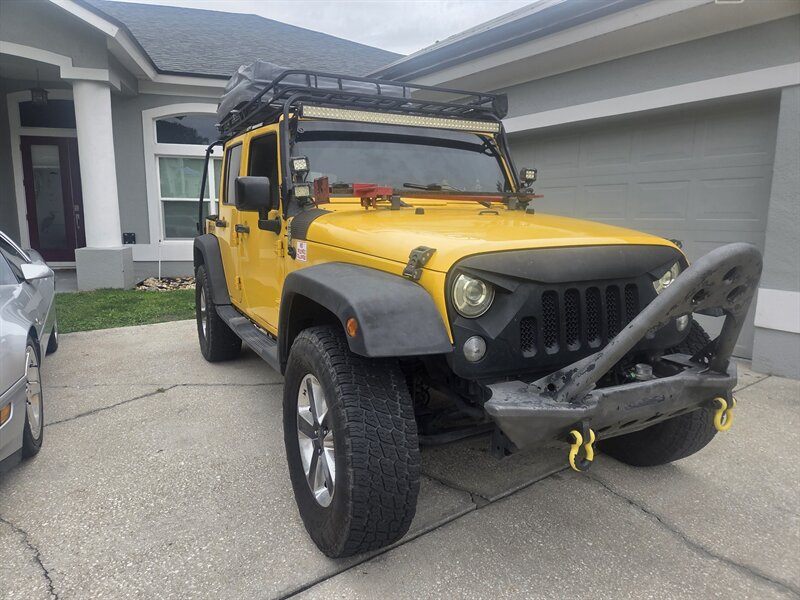 2015 Jeep Wrangler Sport S  Unlimited - Photo 1 - Apopka, FL 32703