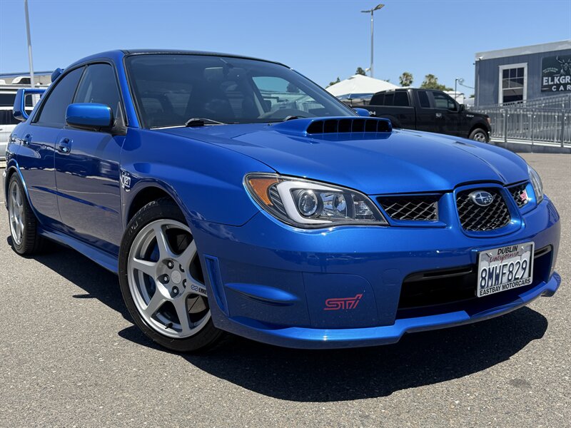 Blue 2006 Subaru Impreza WRX STI Turbo AWD Sedan All-Wheel Drive 6-Speed Manual