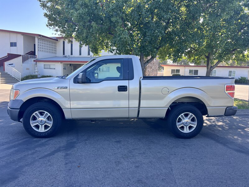 Pueblo Gold Clearcoat Metallic 2009 Ford F-150 Pickup Truck 4X2 Automatic