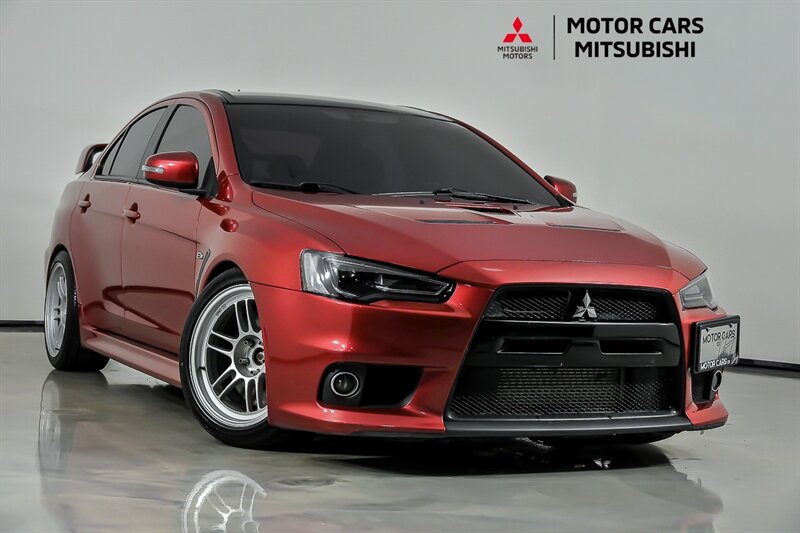 Rally Red w/ Black Roof 2015 Mitsubishi Lancer Evolution Sedan All-Wheel Drive 5-Speed Manual
