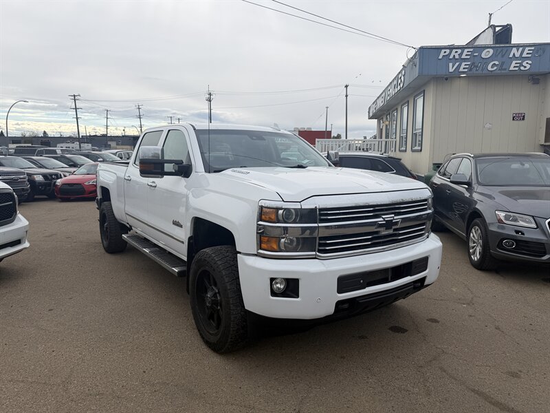 White 2016 Chevrolet Silverado 2500HD High Country Crew Cab 4WD Pickup Truck Four-Wheel Drive Automatic