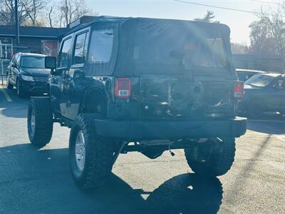 2010 Jeep Wrangler Unlimited Sport   - Photo 6 - Kansas City, MO 64131