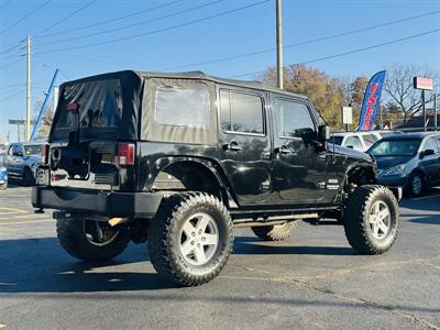 2010 Jeep Wrangler Unlimited Sport   - Photo 3 - Kansas City, MO 64131