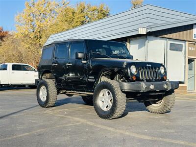 2010 Jeep Wrangler Unlimited Sport   - Photo 1 - Kansas City, MO 64131