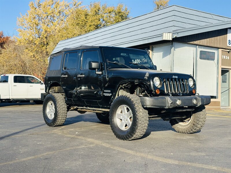 2010 Jeep Wrangler Unlimited Sport   - Photo 1 - Kansas City, MO 64131