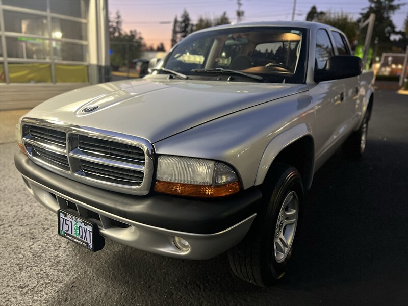 Bright Silver Metallic Clearcoat 2004 Dodge Dakota Pickup Truck Four-Wheel Drive Automatic