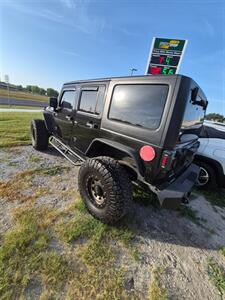 2013 Jeep Wrangler Unlimited Sport   - Photo 2 - Port Lavaca, TX 77979