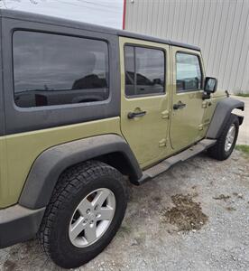 2013 Jeep Wrangler Unlimited Sport   - Photo 2 - Port Lavaca, TX 77979