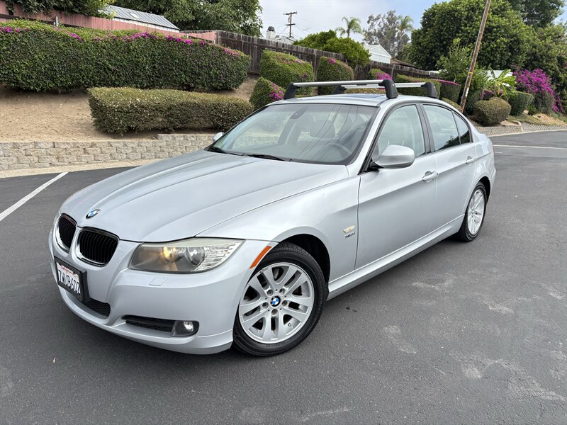 Titanium Silver Metallic 2011 BMW 3 Series Sedan All-Wheel Drive 6-Speed Manual