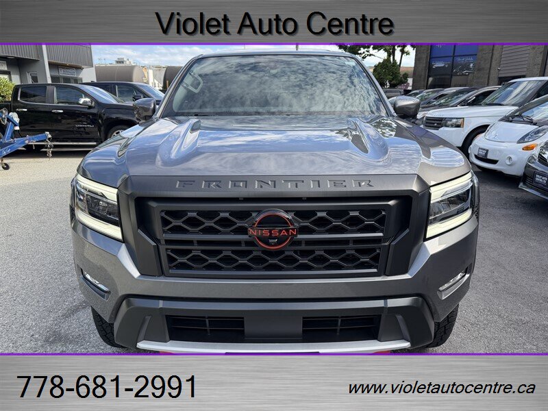 Gray 2024 Nissan Frontier Pickup Truck Four-Wheel Drive Automatic