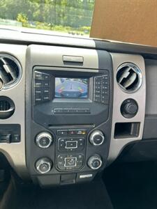 2014 Ford F-150 XLT   - Photo 7 - Huffman, TX 77336