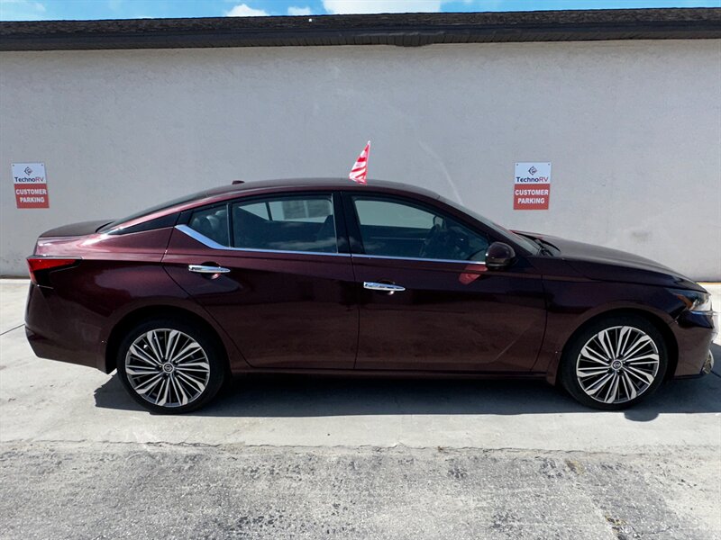 Red (Scarlet Ember Tintcoat) 2024 Nissan Altima 2.5 SL AWD Sedan All-Wheel Drive Continuously Variable Transmission