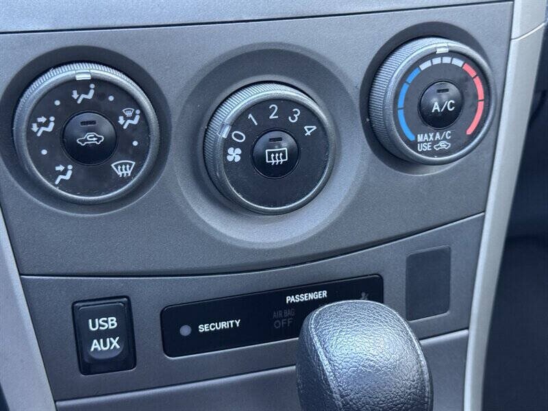 2012 Toyota Corolla L 4dr Sedan 5M - Photo 7 - Seattle, WA 98125