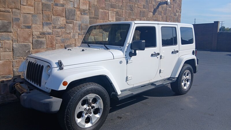 2013 Jeep Wrangler Unlimited Sahara - Photo 7 - Brunswick, OH 44212